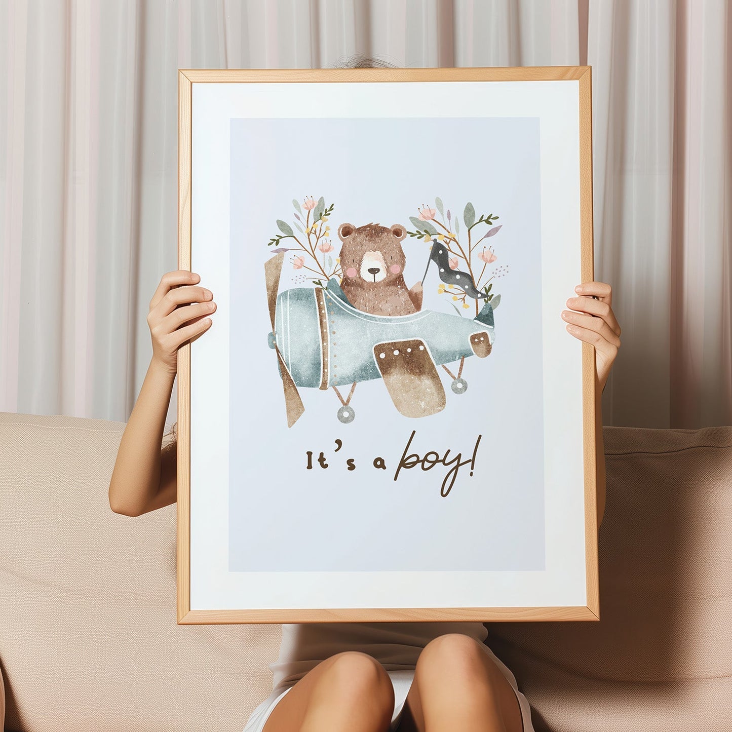 Kinderzimmerbild mit einem Bär in einem Flugzeig und dem Text it´s a boy poster für das Kinderzimmer